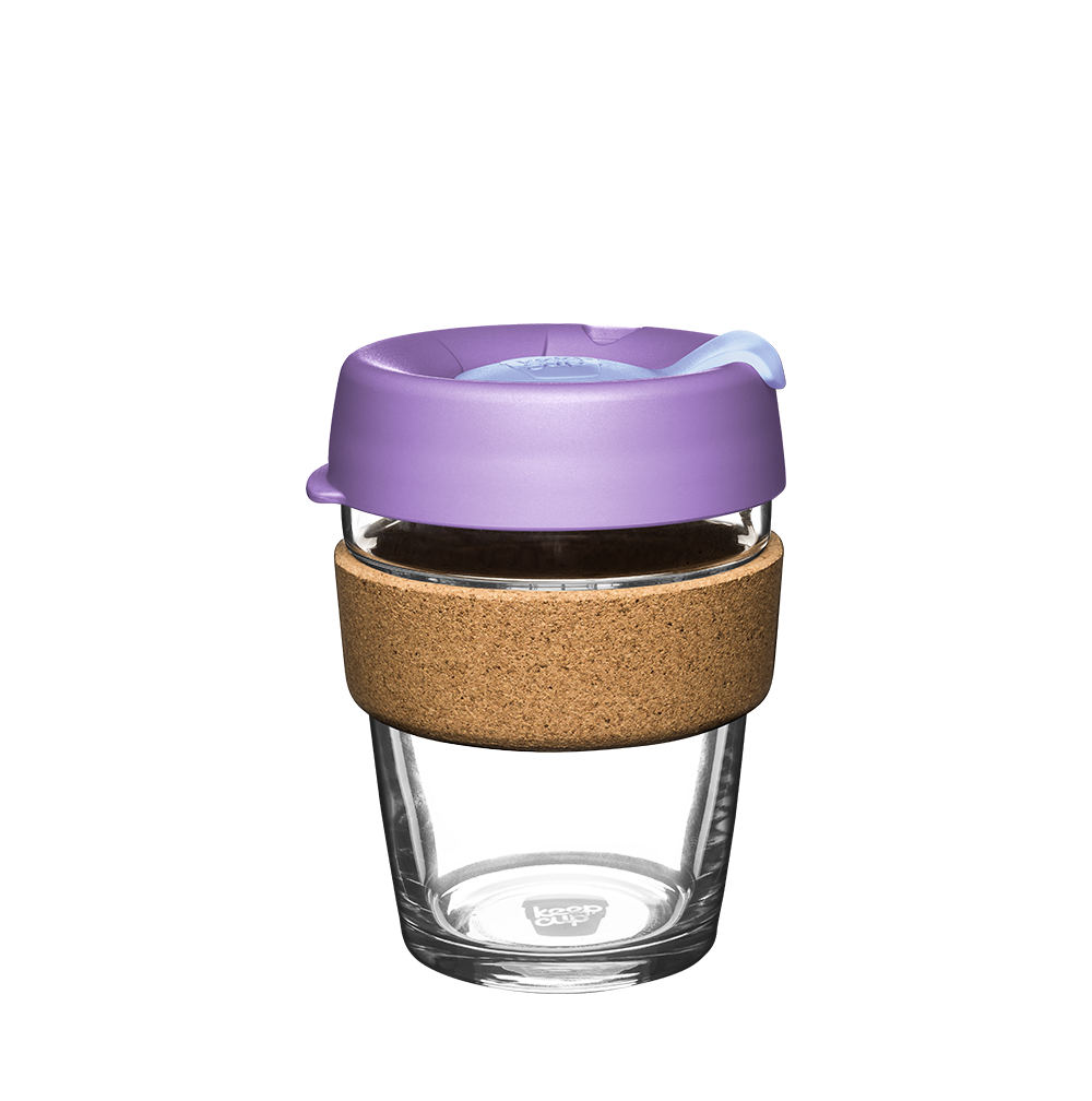 KeepCup Brew Cork M 12oz in Moonlight, featuring a clear glass cup with natural cork band and lavender-coloured lid with sipper closure, shown against a white background.
