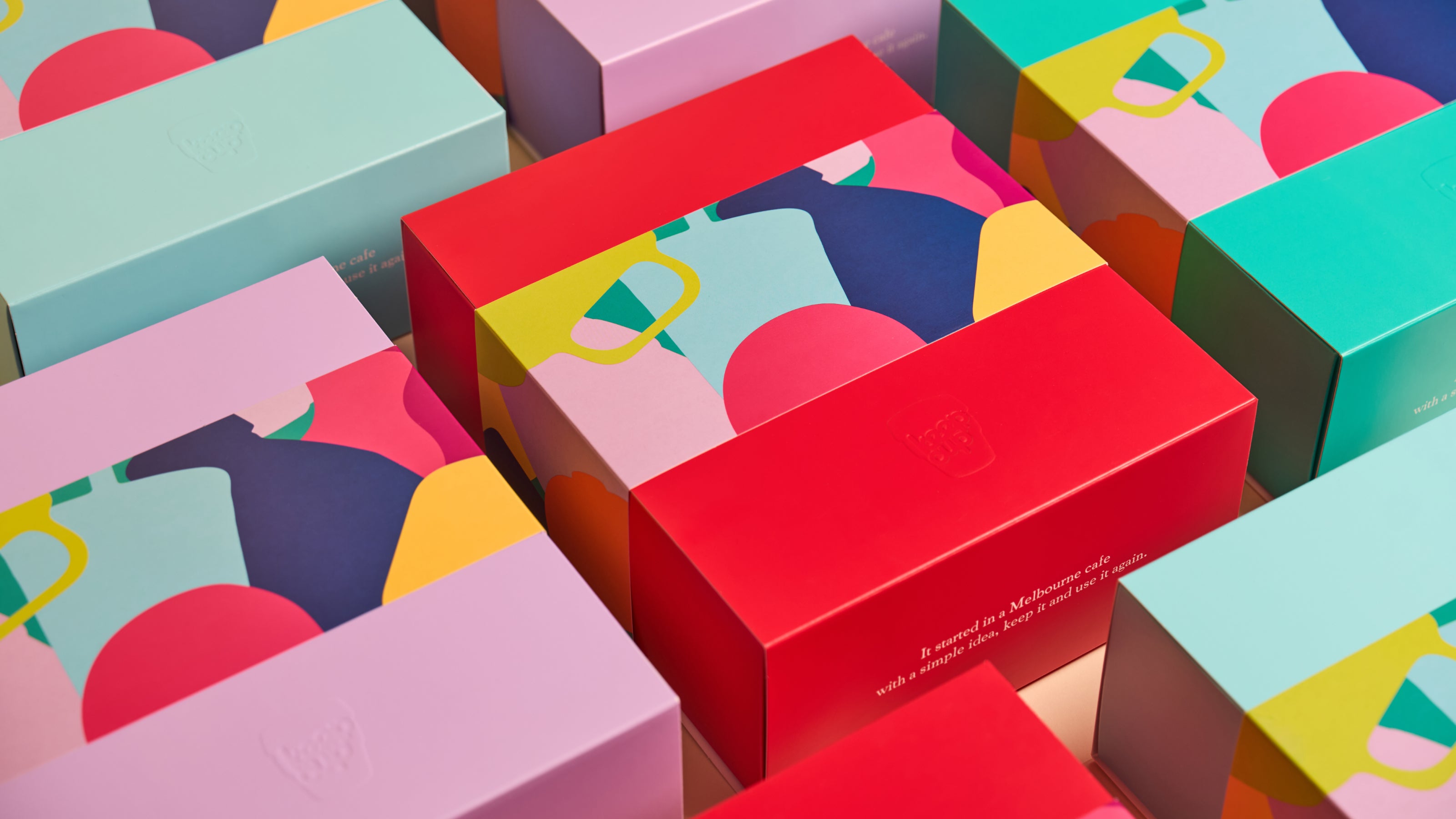 Colorful geometric-patterned boxes arranged in a visually appealing manner.
