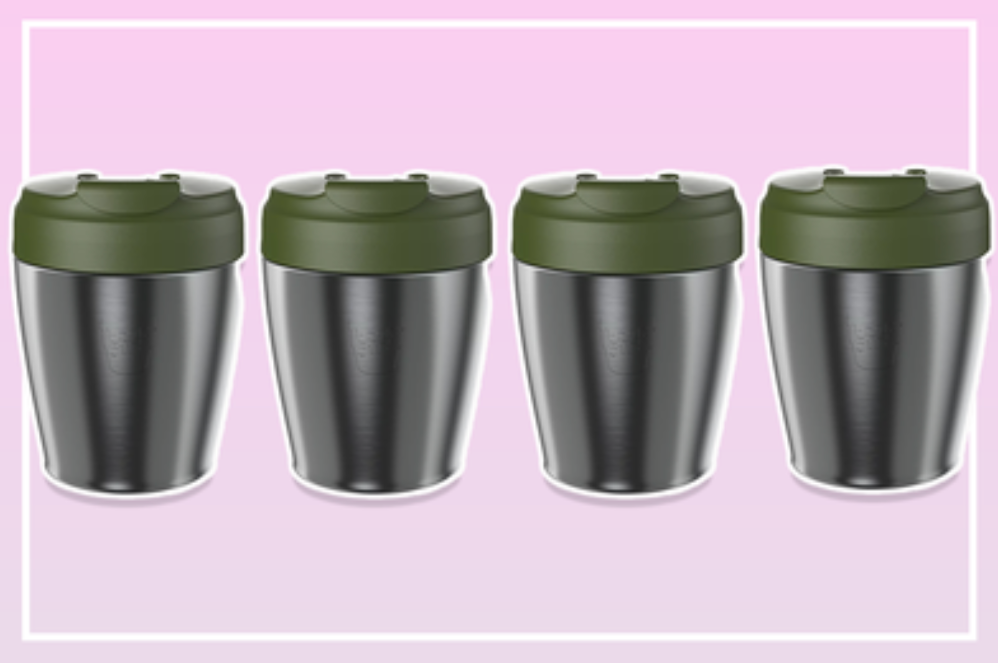 Four stainless steel reusable coffee cups with olive green lids arranged in a row on pink background