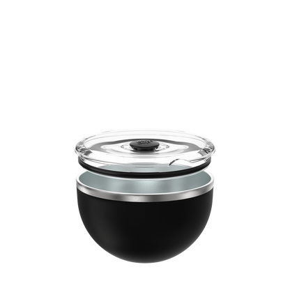 KeepCup Go Bowl Luxe in Black with flat lid, shown in an exploded view displaying the clear plastic lid with central valve, black silicone seal, stainless steel rim, and matte black rounded bowl base.