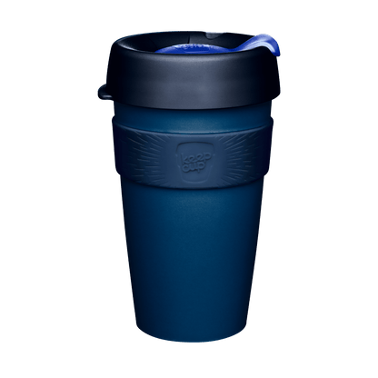 KeepCup Original L 16oz reusable coffee cup in Deep Ink, featuring a dark navy blue cup body, matching blue silicone band with embossed KeepCup logo, and charcoal lid with blue plug, shown against a white background.