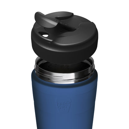 Close-up of a blue KeepCup insulated travel mug with a black flip lid, shown on a plain white background.
