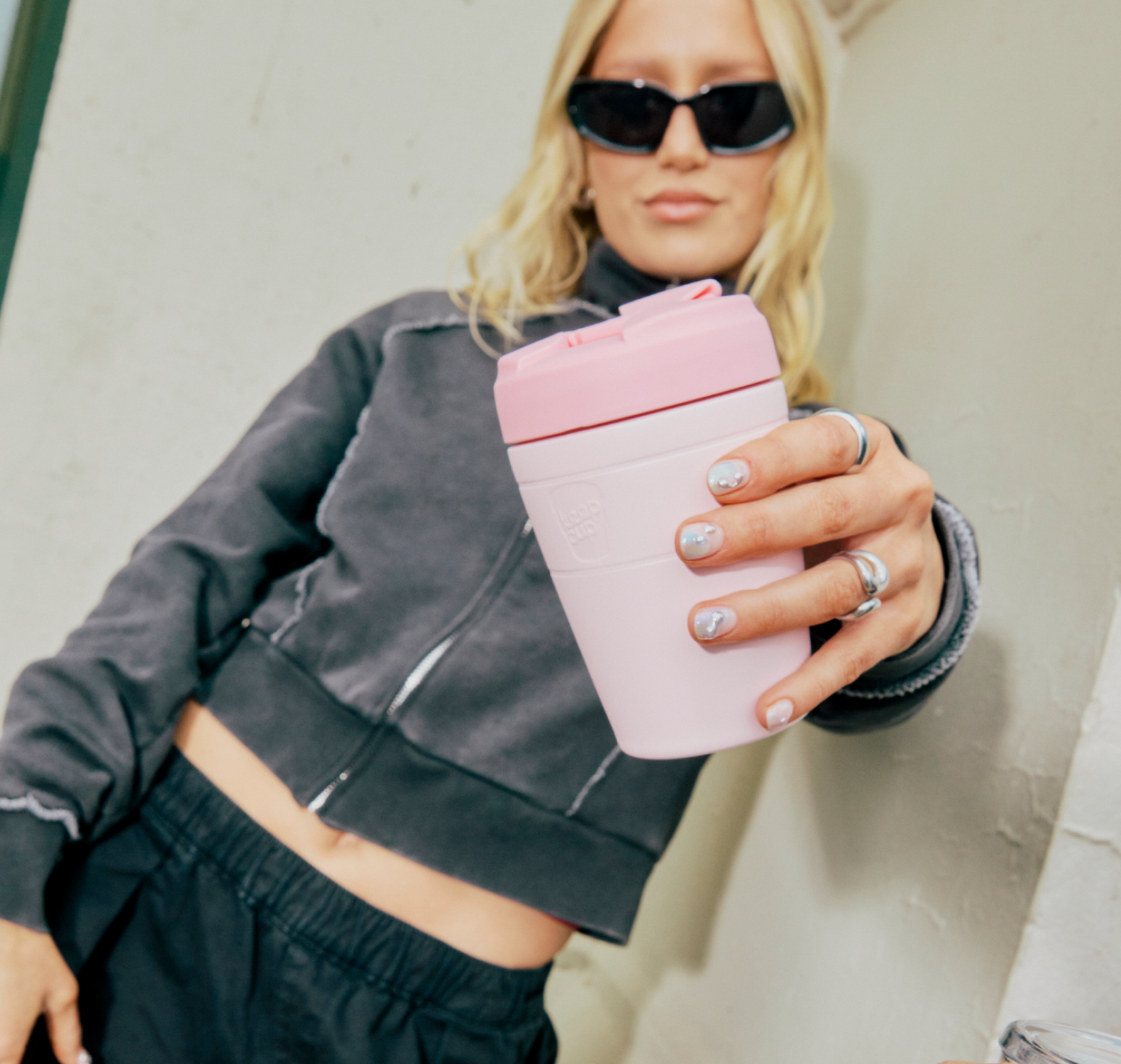 Person holding a Commuter in Pashmak Pink with a neutral background